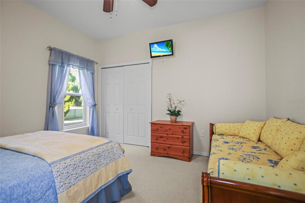 4503 North Rye Road Parrish, FL 34219 - Photo 33 of 68 a bedroom with bed and window