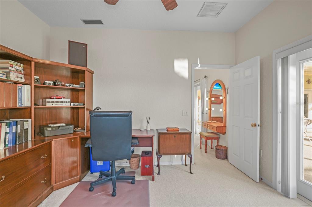 4503 North Rye Road Parrish, FL 34219 - Photo 39 of 68 a room that has a couch and a chair in it