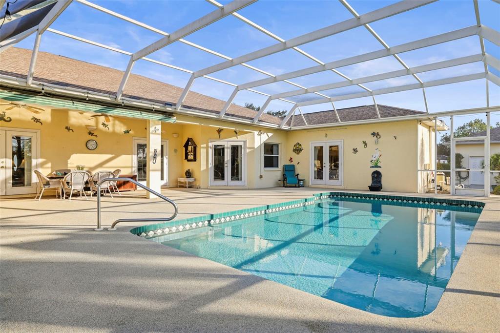4503 North Rye Road Parrish, FL 34219 - Photo 43 of 68 a swimming pool with outdoor seating