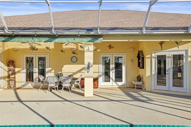 a view of a swimming pool and an outdoor space