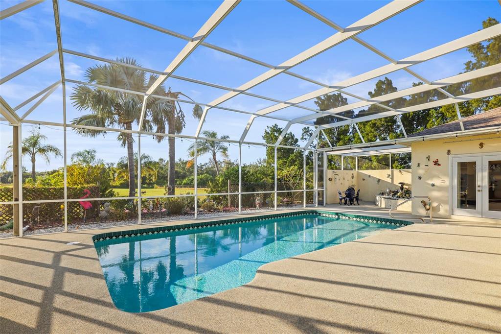 4503 North Rye Road Parrish, FL 34219 - Photo 47 of 68 a view of a building with a floor to ceiling window and deck