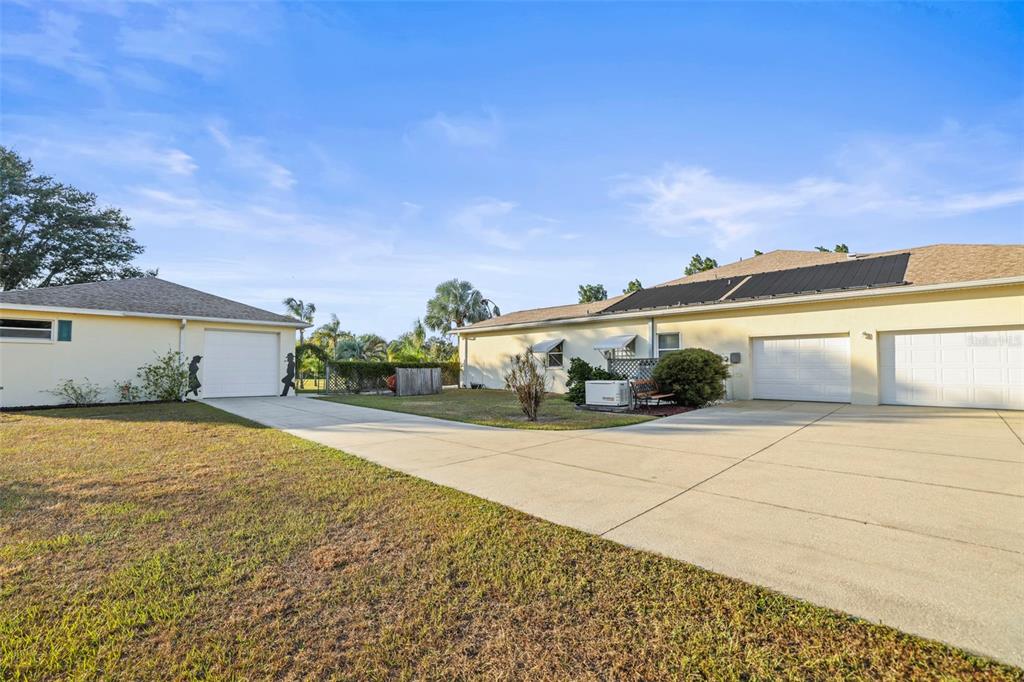 4503 North Rye Road Parrish, FL 34219 - Photo 48 of 68 a front view of a house with a yard and garage