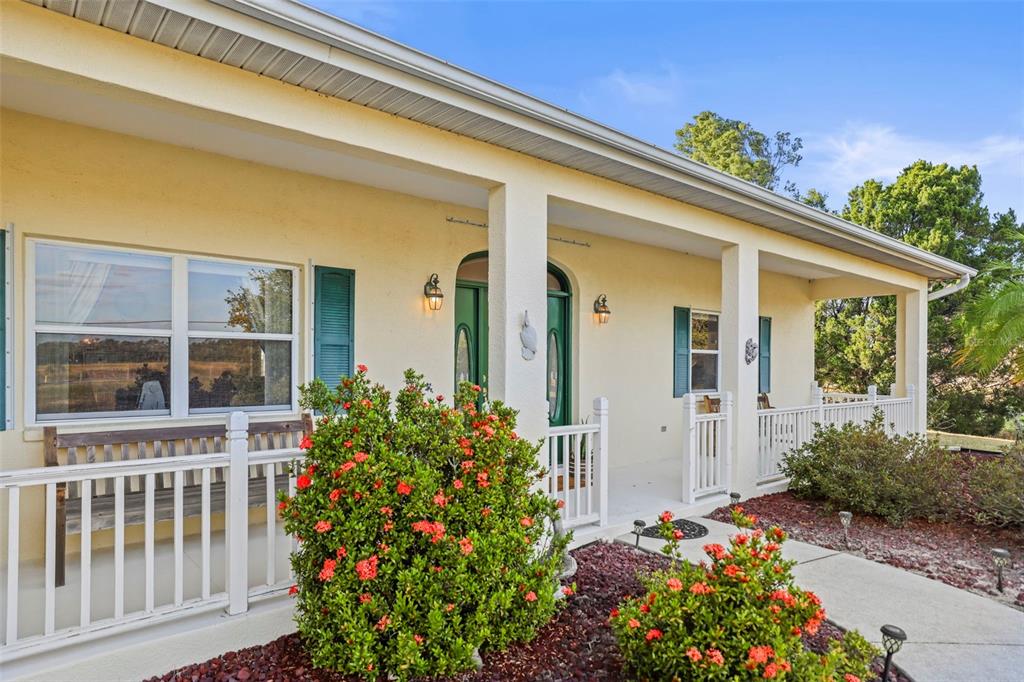 4503 North Rye Road Parrish, FL 34219 - Photo 7 of 68 a front view of a house with a porch