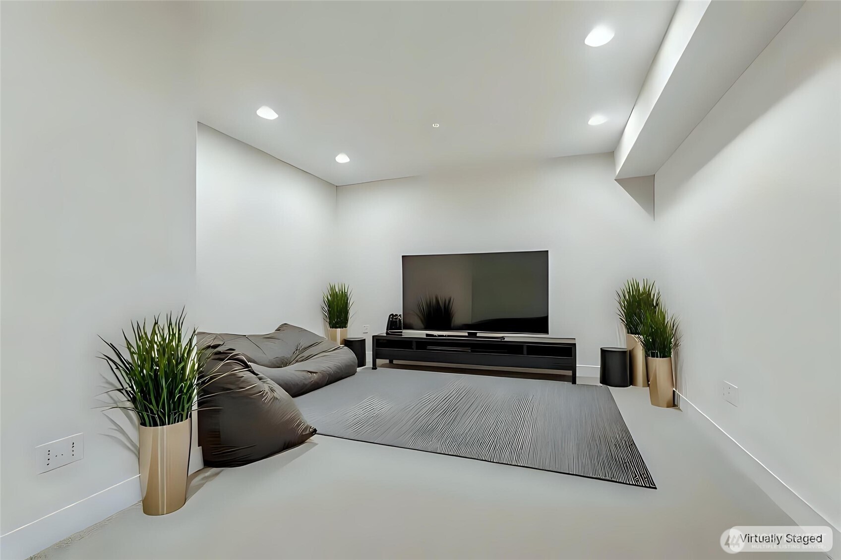 16555 Carlyle Hall Road North Shoreline, WA 98133 - Photo 22 of 27 a living room with furniture and a flat screen tv