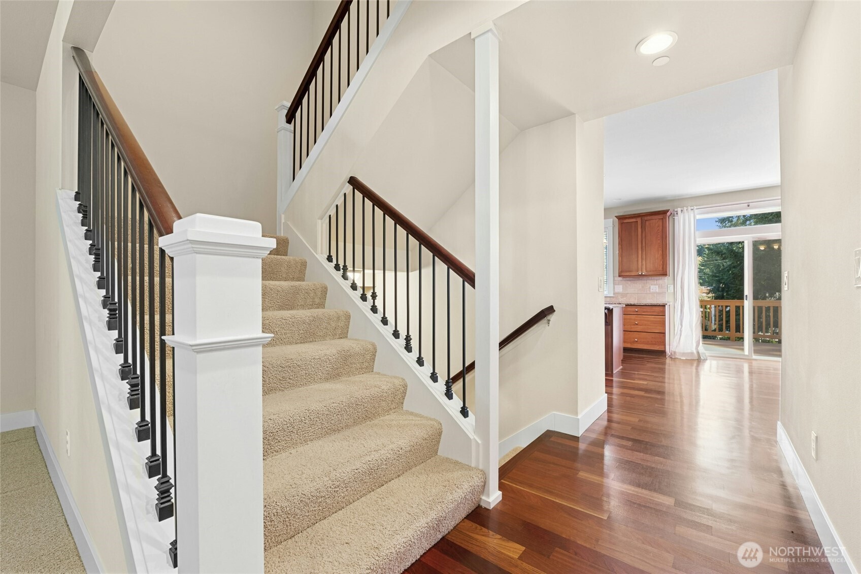 16555 Carlyle Hall Road North Shoreline, WA 98133 - Photo 6 of 27 a view of staircase with white walls and a window
