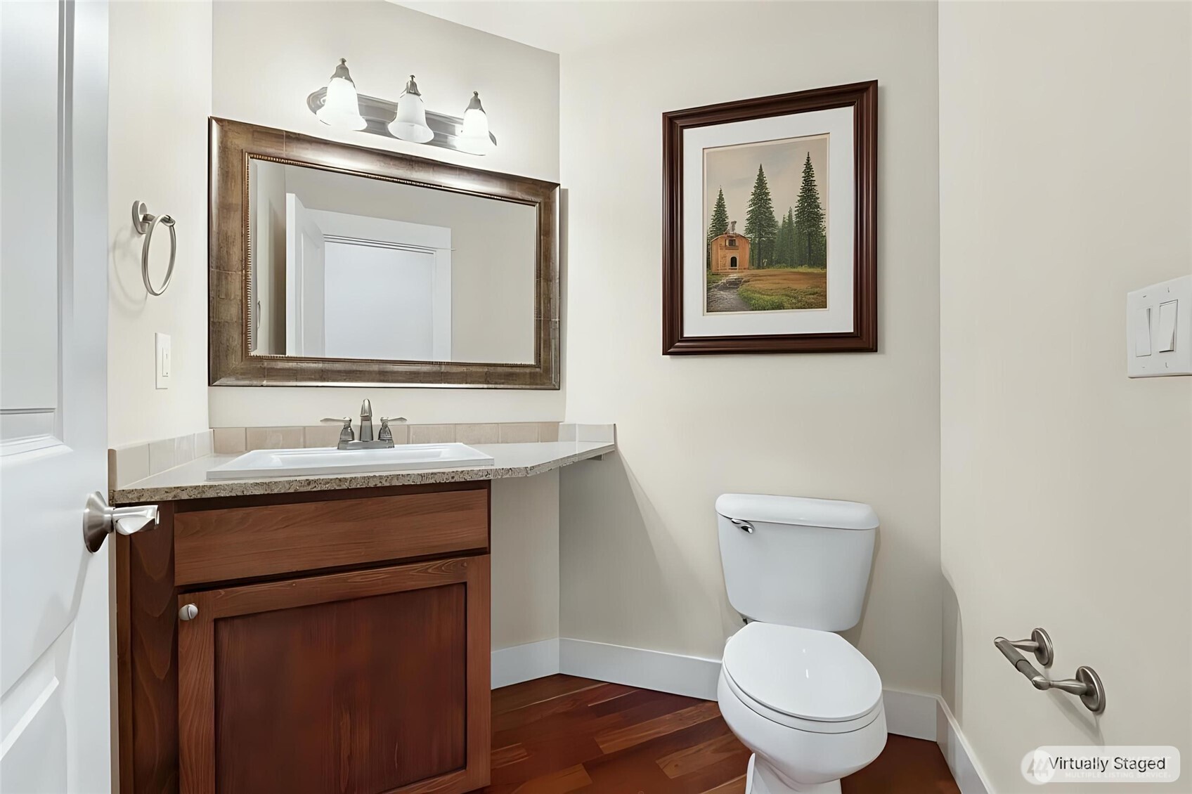 16555 Carlyle Hall Road North Shoreline, WA 98133 - Photo 10 of 27 a bathroom with a toilet sink and mirror