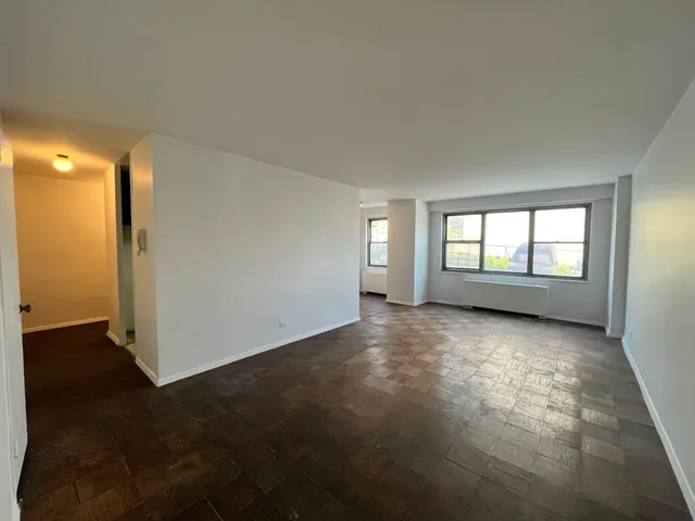 an empty room with windows