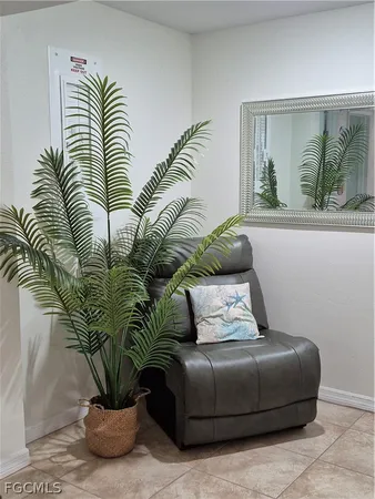 a bedroom with a bed with outer view