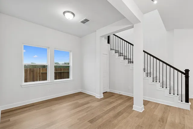 a view of an empty walk in closet