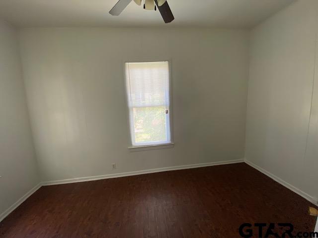 306 South Fenton Avenue Tyler, TX 75702 - Photo 8 of 11 an empty room with a window