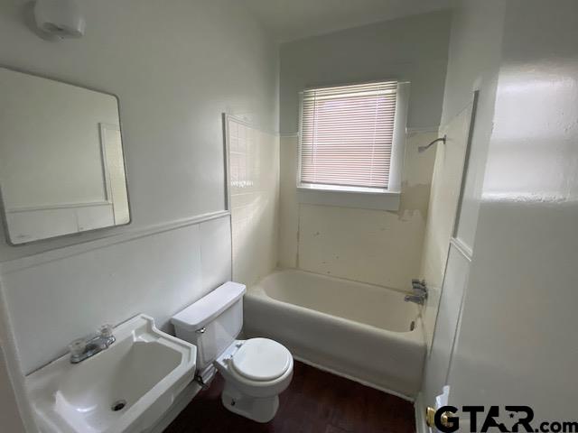 306 South Fenton Avenue Tyler, TX 75702 - Photo 10 of 11 a bathroom with a sink toilet and shower