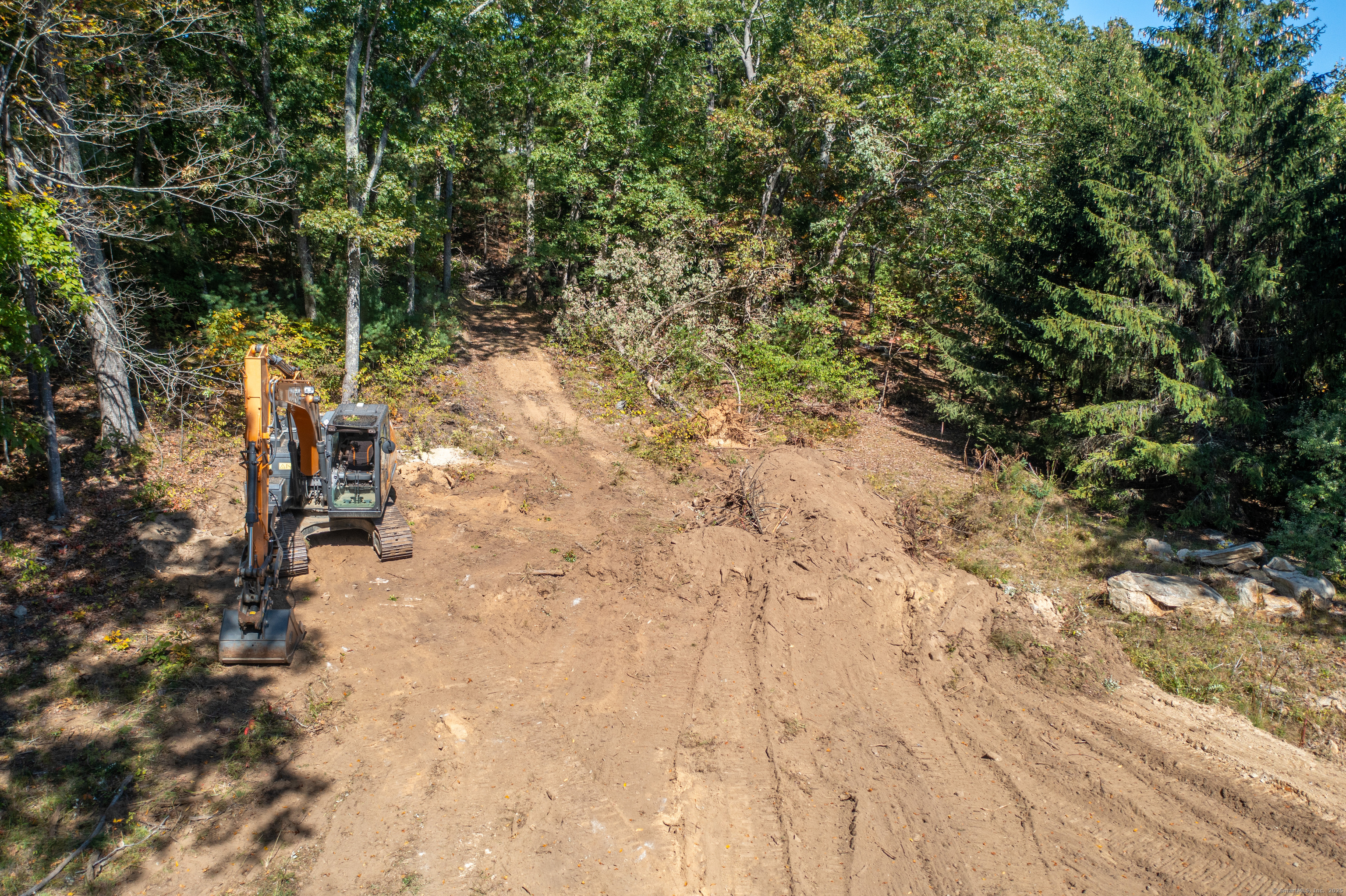 66 Bates Avenue Putnam, CT 06260 - Photo 12 of 18 a view of a yard with plants and trees