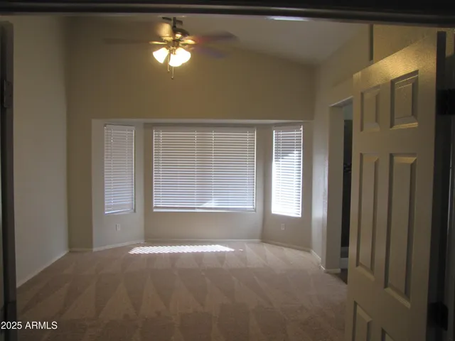 a view of empty room with a window