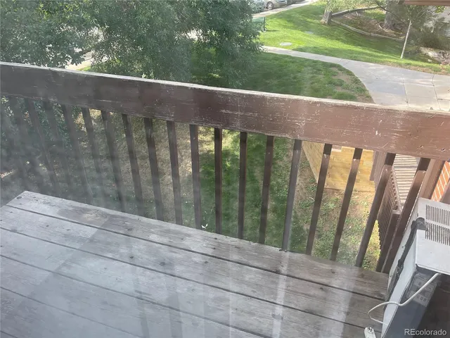 a view of a wooden fence