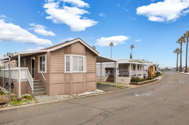 a front view of a house with a garage