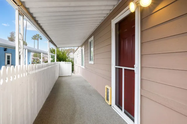 a view of a house with a street