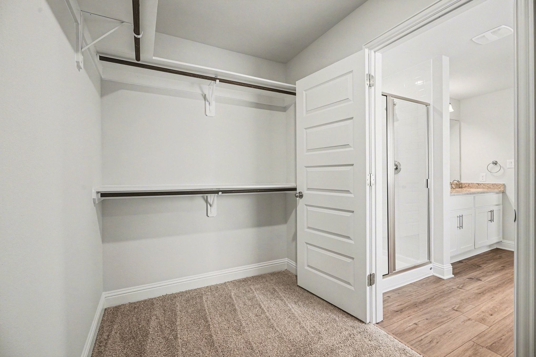 5 Keystone Court Angleton, TX 77515 - Photo 18 of 33 a view of an empty walk in closet