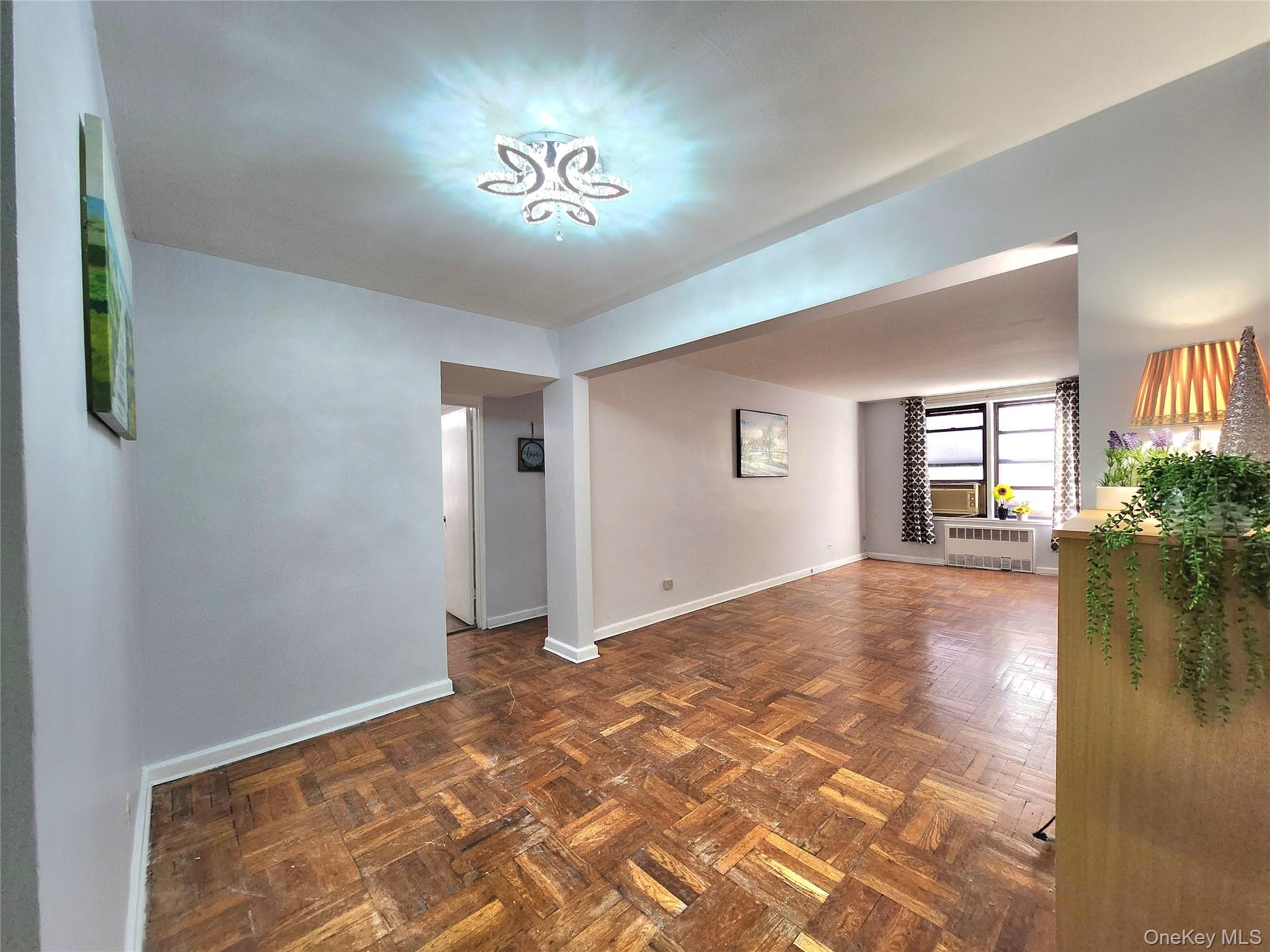 a view of an empty room and window