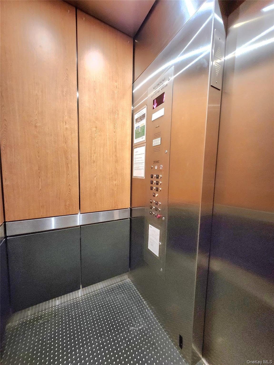 33-27 91st Street, Unit 1J Queens, NY 11372 - Photo 19 of 27 a bathroom with a glass shower door