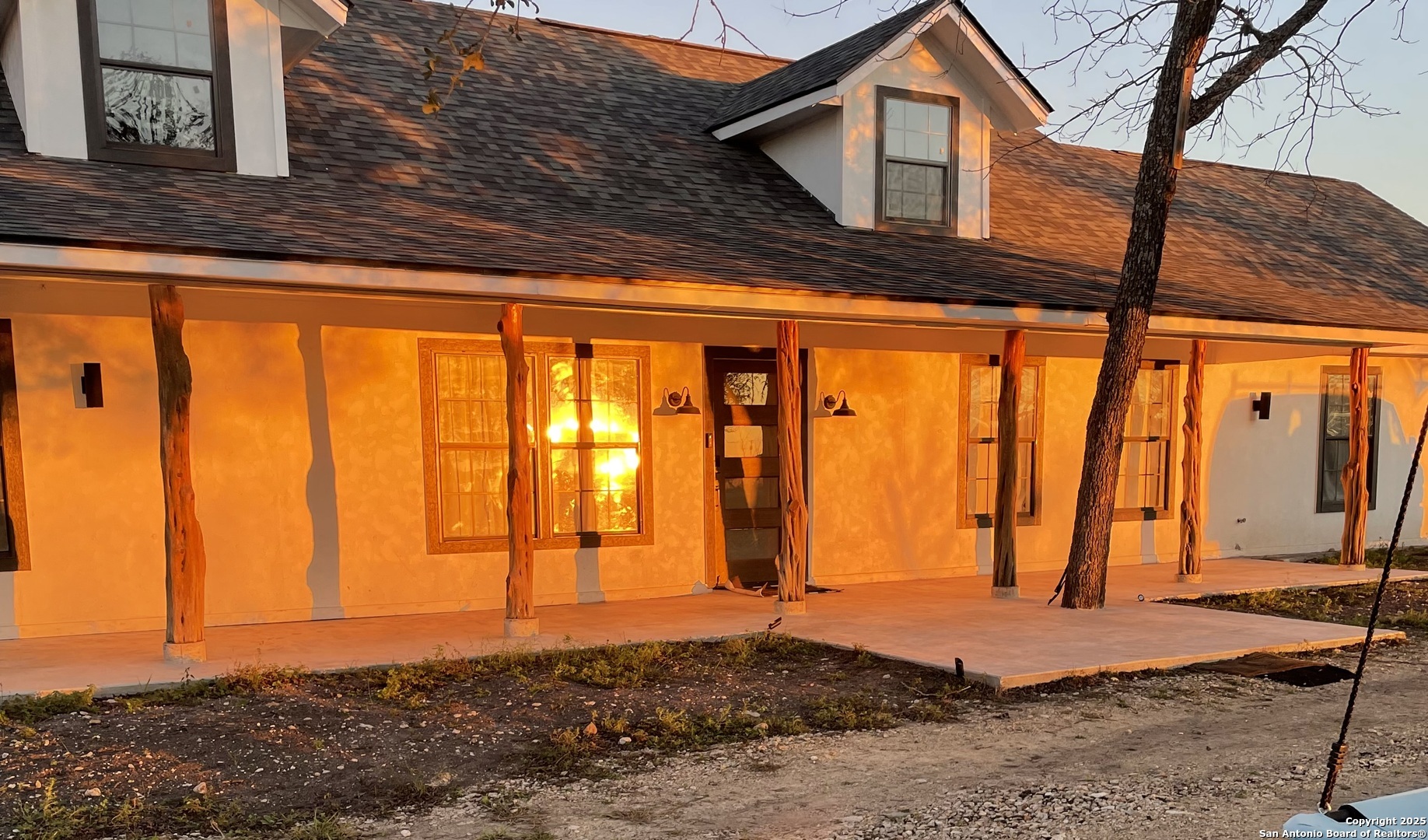 210 County Road 4643 Hondo, TX 78861 - Photo 2 of 13 a view of backyard with blue walls
