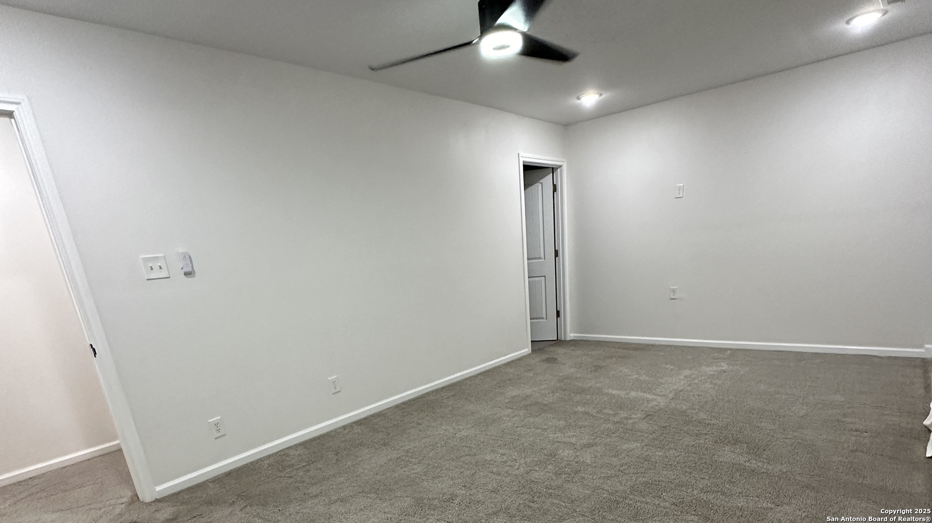 210 County Road 4643 Hondo, TX 78861 - Photo 6 of 13 wooden floor in an empty room