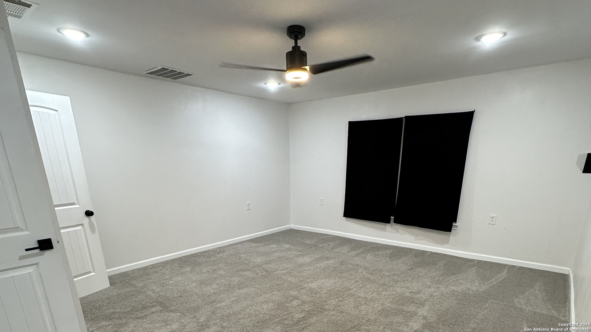210 County Road 4643 Hondo, TX 78861 - Photo 10 of 13 wooden floor in an empty room