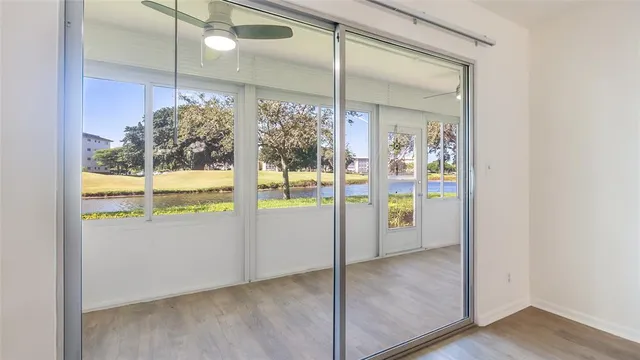 a view of a bathroom with a glass door