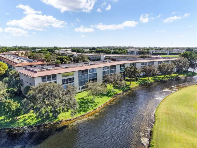a view of a lake with a city