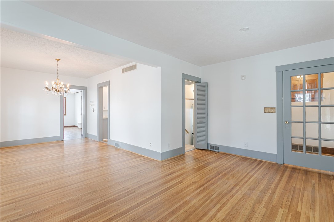 176 Merwin Avenue Rochester, NY 14609 - Photo 3 of 24 Living room to dining room perspective