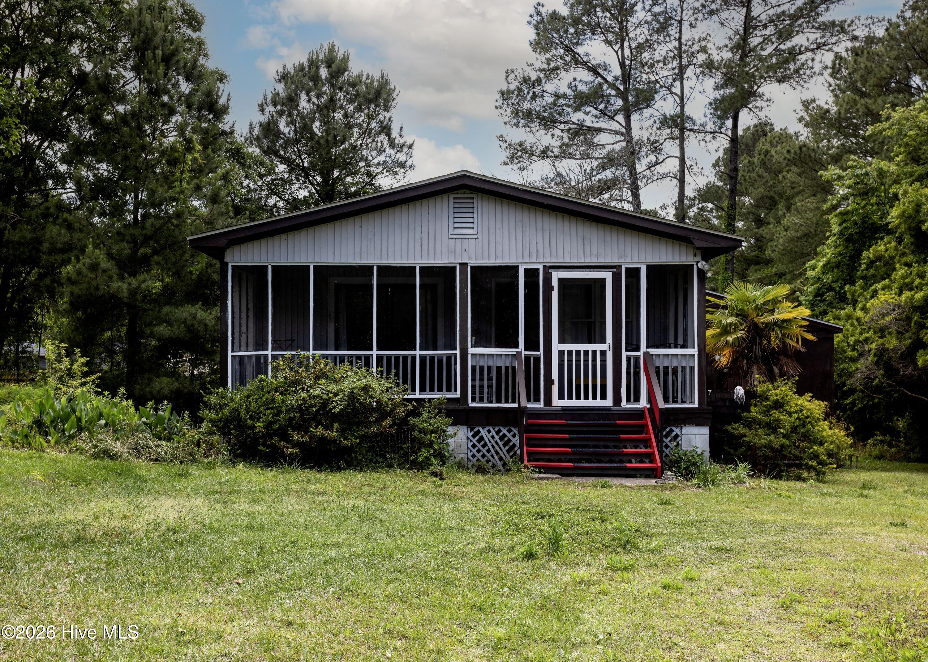 408 Old Folkstone Road Holly Ridge, NC 28445 - Photo 1 of 22 a front 1