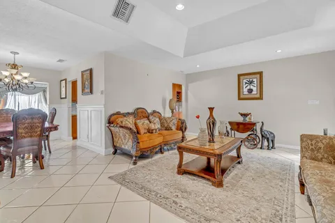 a living room with furniture and a table