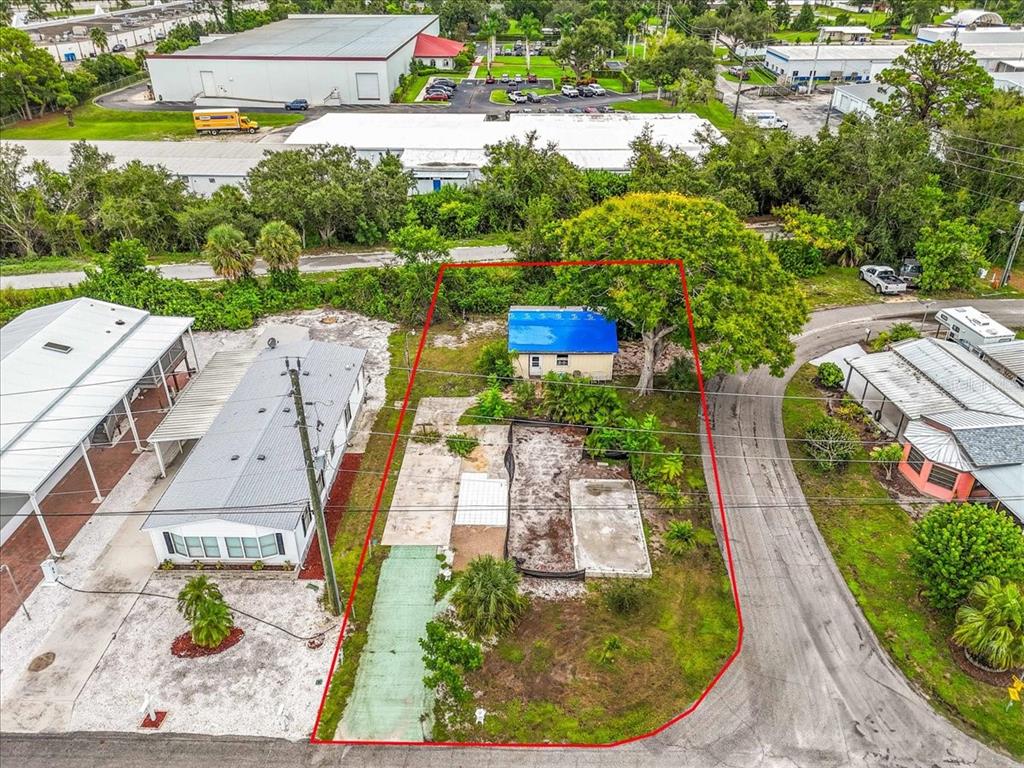 30 Hatchett Creek Road Venice, FL 34285 - Photo 11 of 17 an aerial view of a house with garden space and lake view