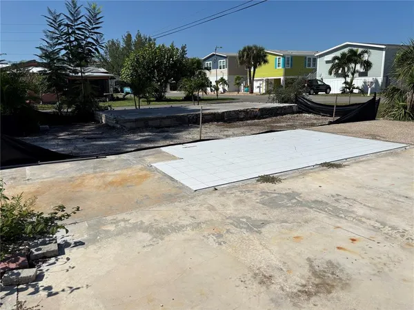 a view of a water fountain in front of a house