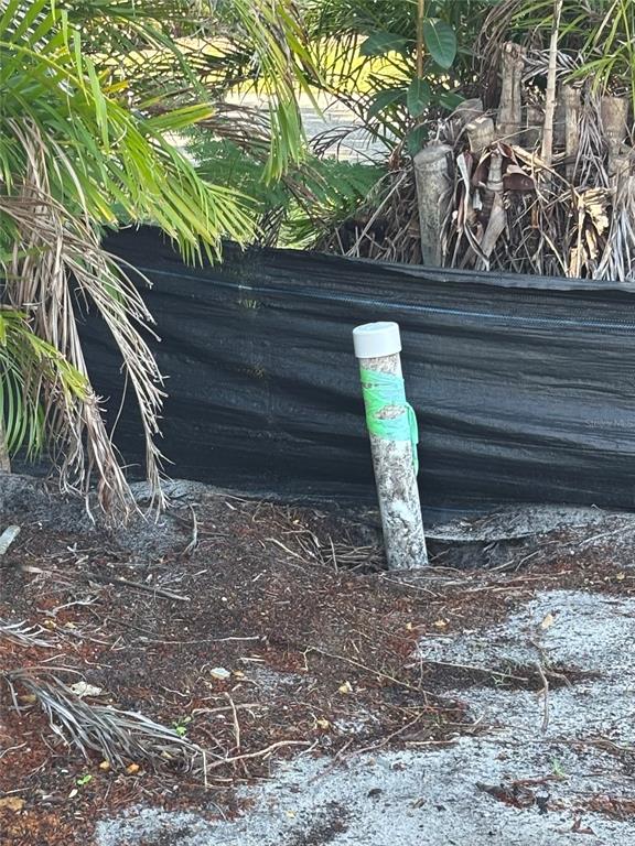 30 Hatchett Creek Road Venice, FL 34285 - Photo 9 of 17 a view of house with wooden fence