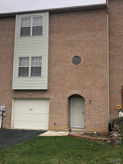 3423 Limestone Drive Whitehall, PA 18052 - Photo 1 of 10 a front view of a house with garden