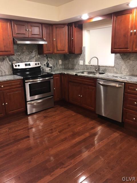 3423 Limestone Drive Whitehall, PA 18052 - Photo 2 of 10 a kitchen with granite countertop a sink and cabinets