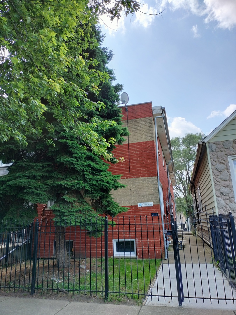 7910 South Muskegon Avenue, Unit 1 Chicago, IL 60617 - Photo 1 of 21