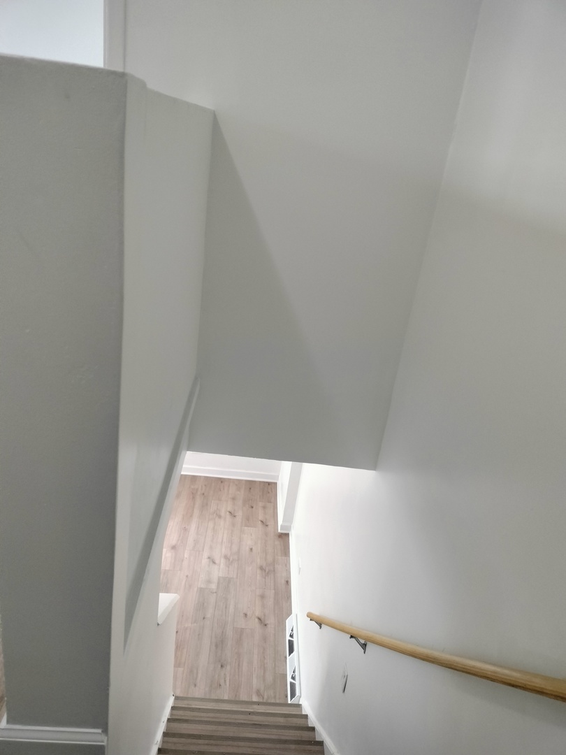 7910 South Muskegon Avenue, Unit 1 Chicago, IL 60617 - Photo 6 of 21 a view of stairs