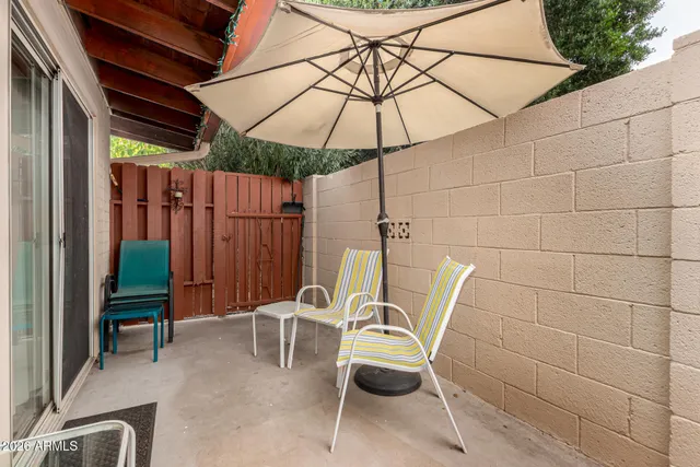 a view of chair and tables in the patio