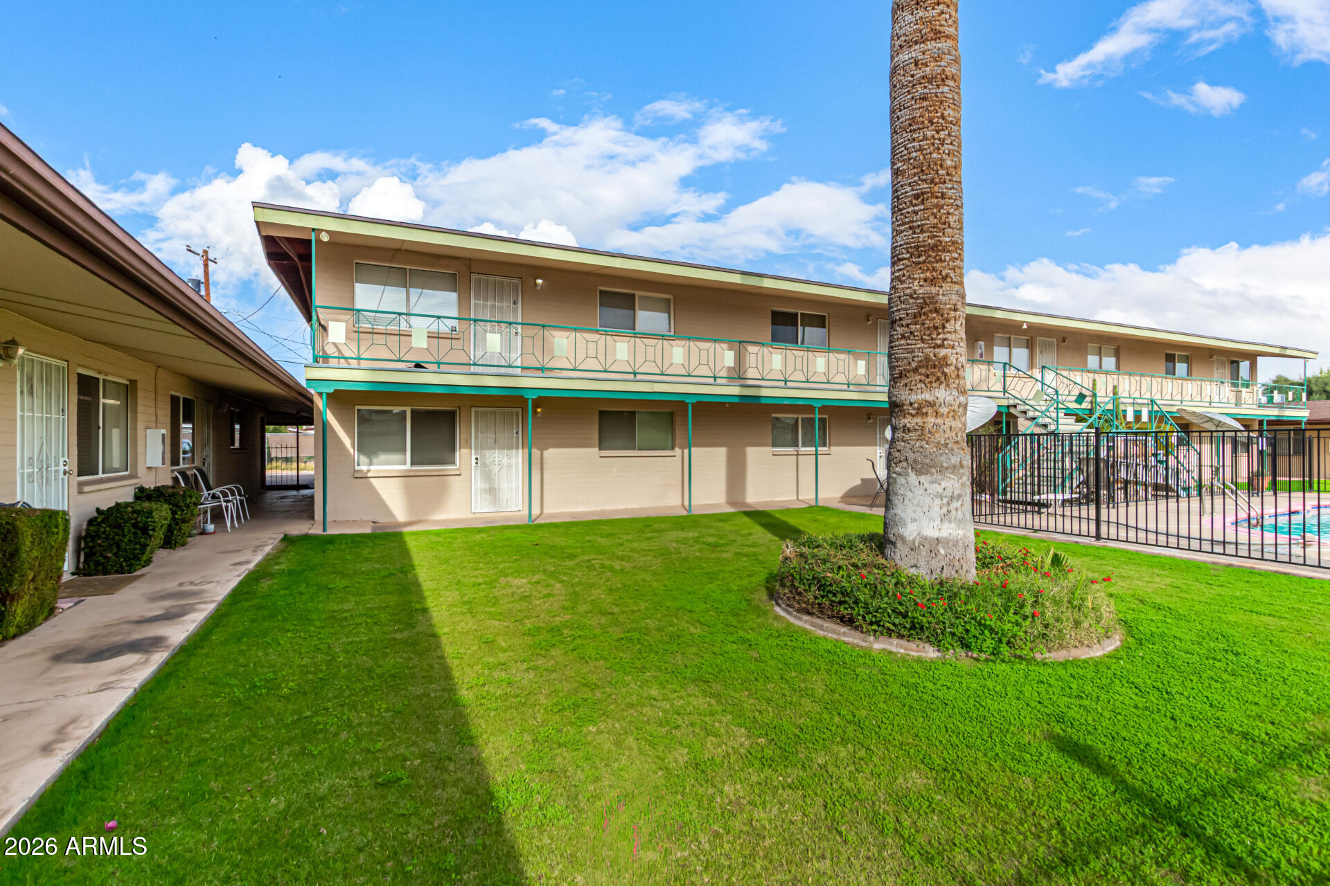 1908 West Berridge Lane, Unit 1 Phoenix, AZ 85015 - Photo 26 of 29 a view of an house with backyard porch and garden