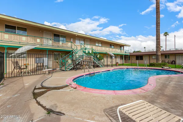 a view of outdoor space yard swimming pool and porch