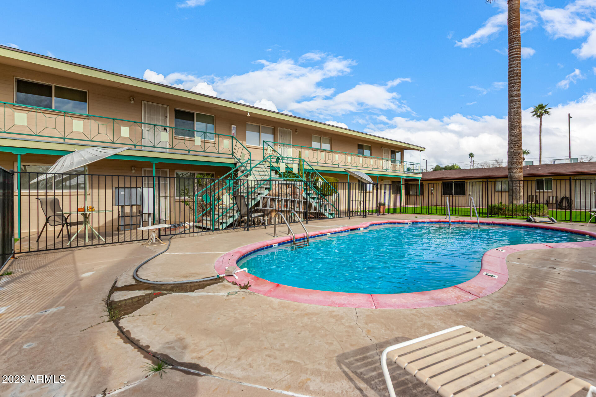 1908 West Berridge Lane, Unit 1 Phoenix, AZ 85015 - Photo 28 of 29 a view of outdoor space yard swimming pool and porch