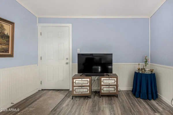 a view of livingroom with furniture and flat screen tv