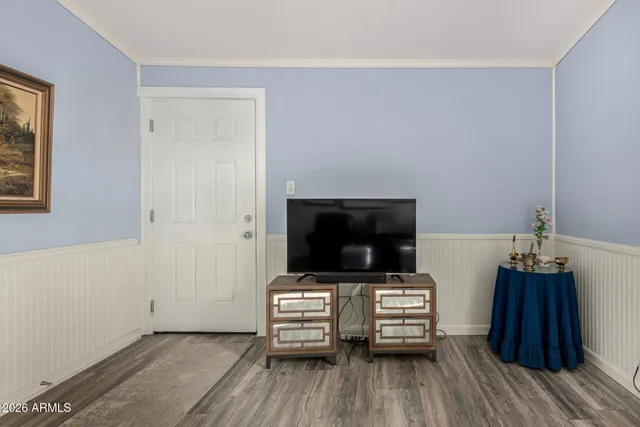 a view of livingroom with furniture and flat screen tv