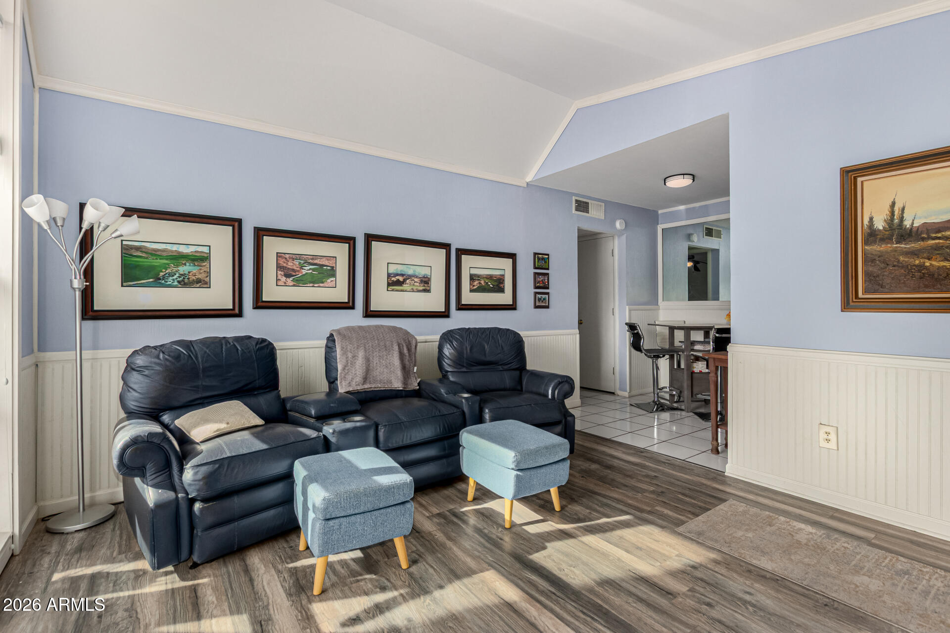 1908 West Berridge Lane, Unit 1 Phoenix, AZ 85015 - Photo 7 of 29 a living room with furniture and painting on the wall