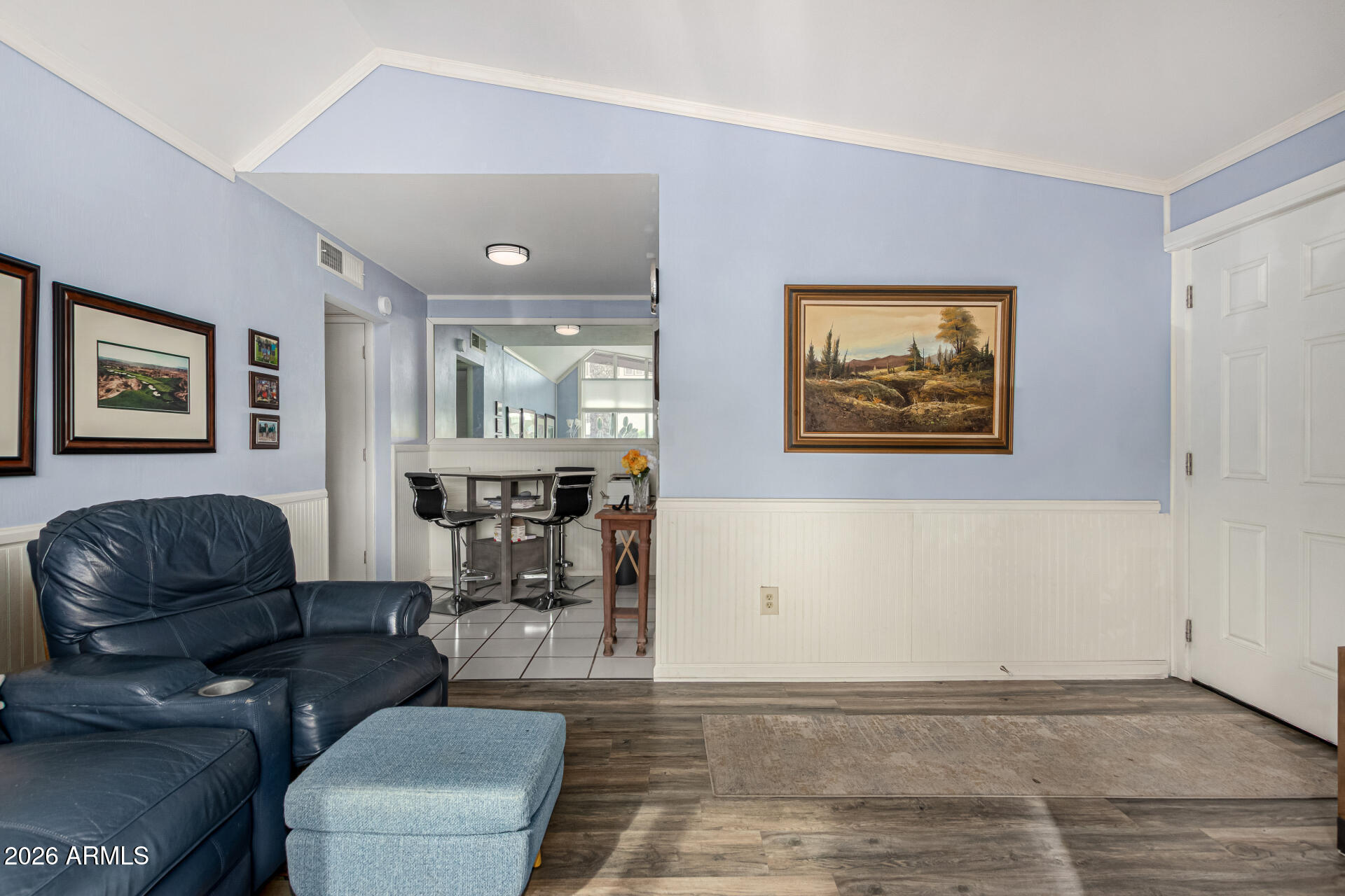 1908 West Berridge Lane, Unit 1 Phoenix, AZ 85015 - Photo 9 of 29 a living room with furniture and wooden floor
