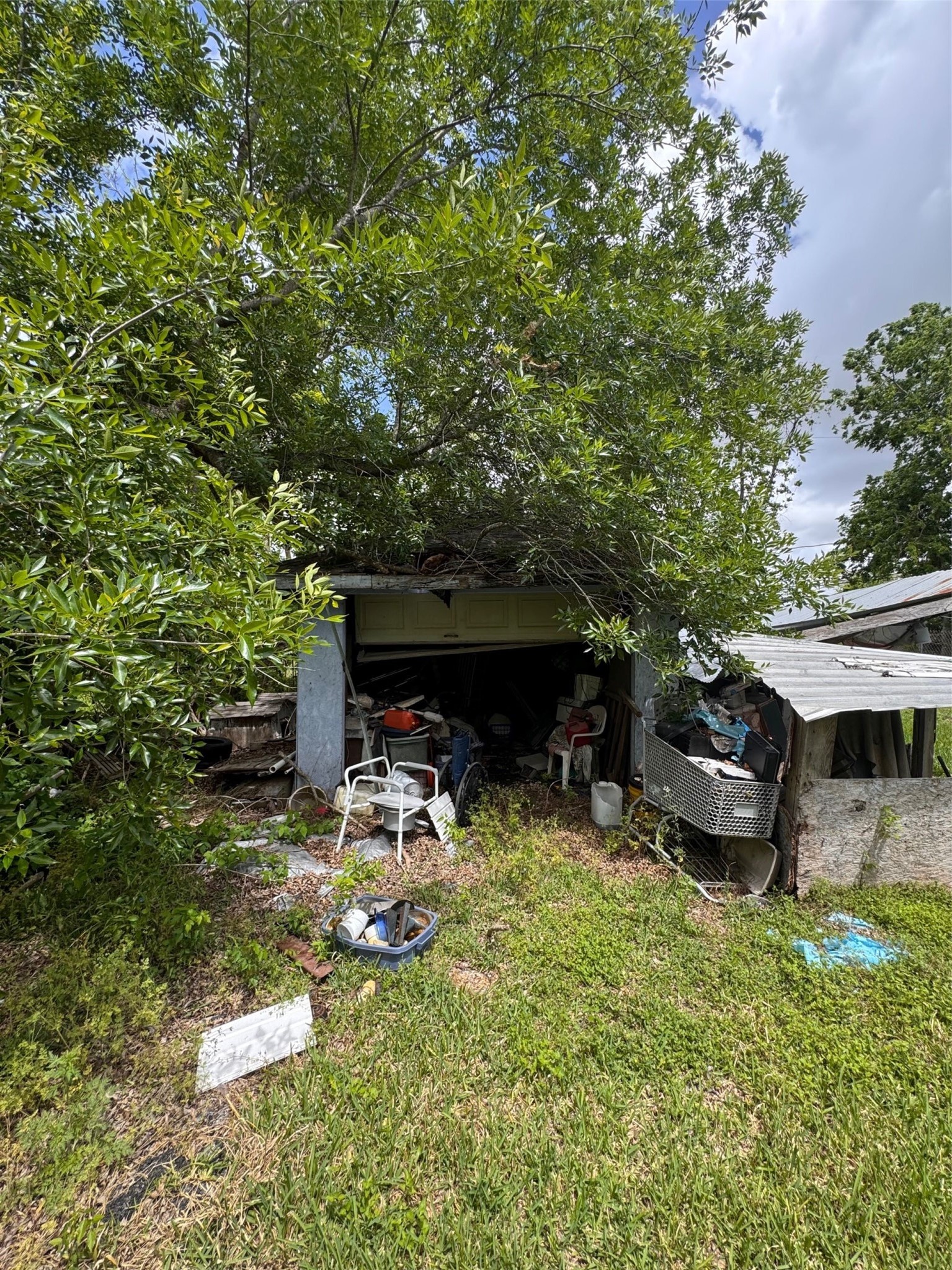 6021 Hertford Street Houston, TX 77048 - Photo 13 of 16 a view of a backyard with sitting area and furniture