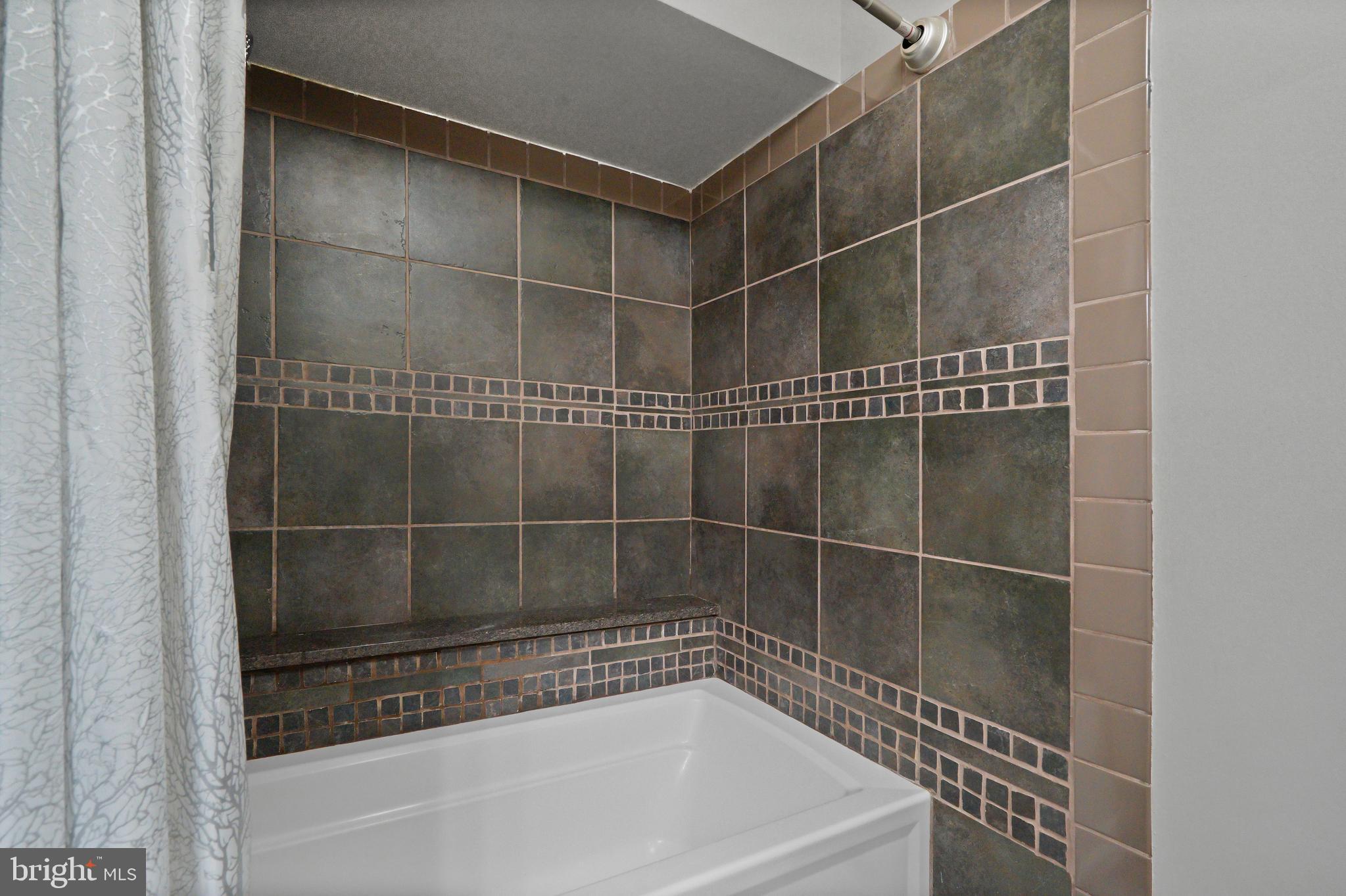 1435 Church Hill Place Reston, VA 20194 - Photo 13 of 30 a bathroom with a bathtub