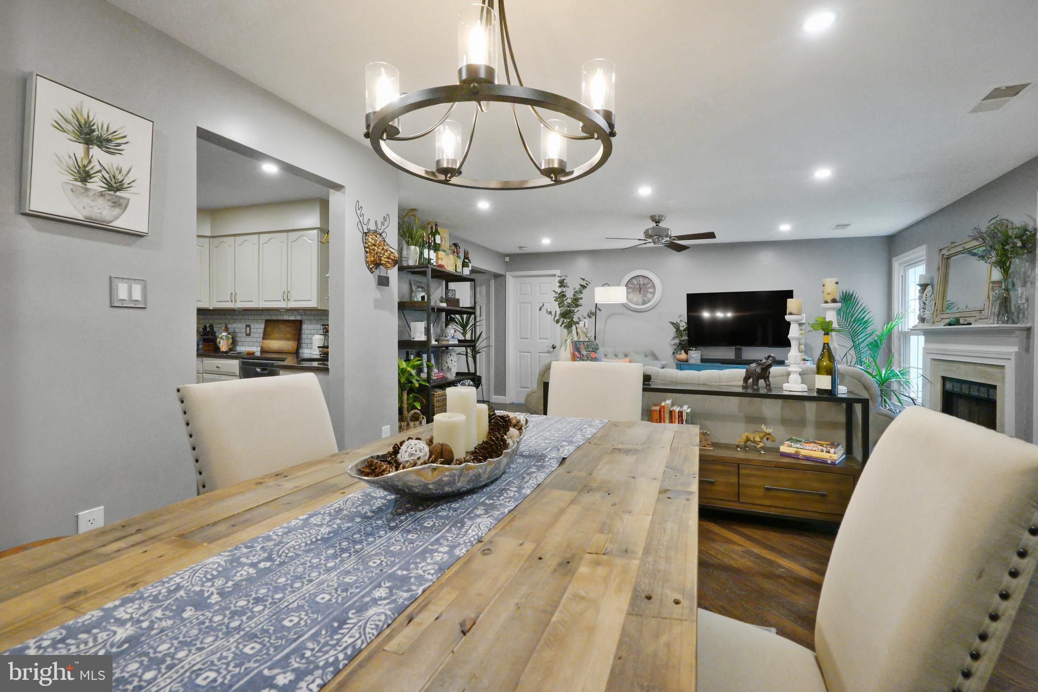 1435 Church Hill Place Reston, VA 20194 - Photo 7 of 30 a living room with furniture and a flat screen tv