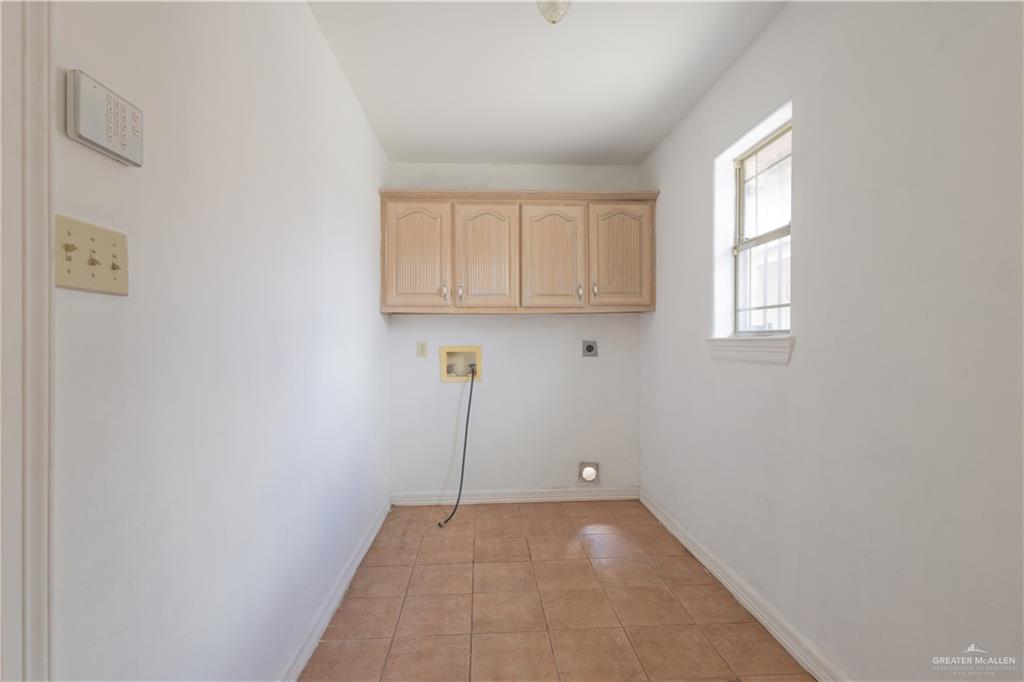 3909 Tulipan Street Mission, TX 78573 - Photo 11 of 18 a view of an empty room with a window